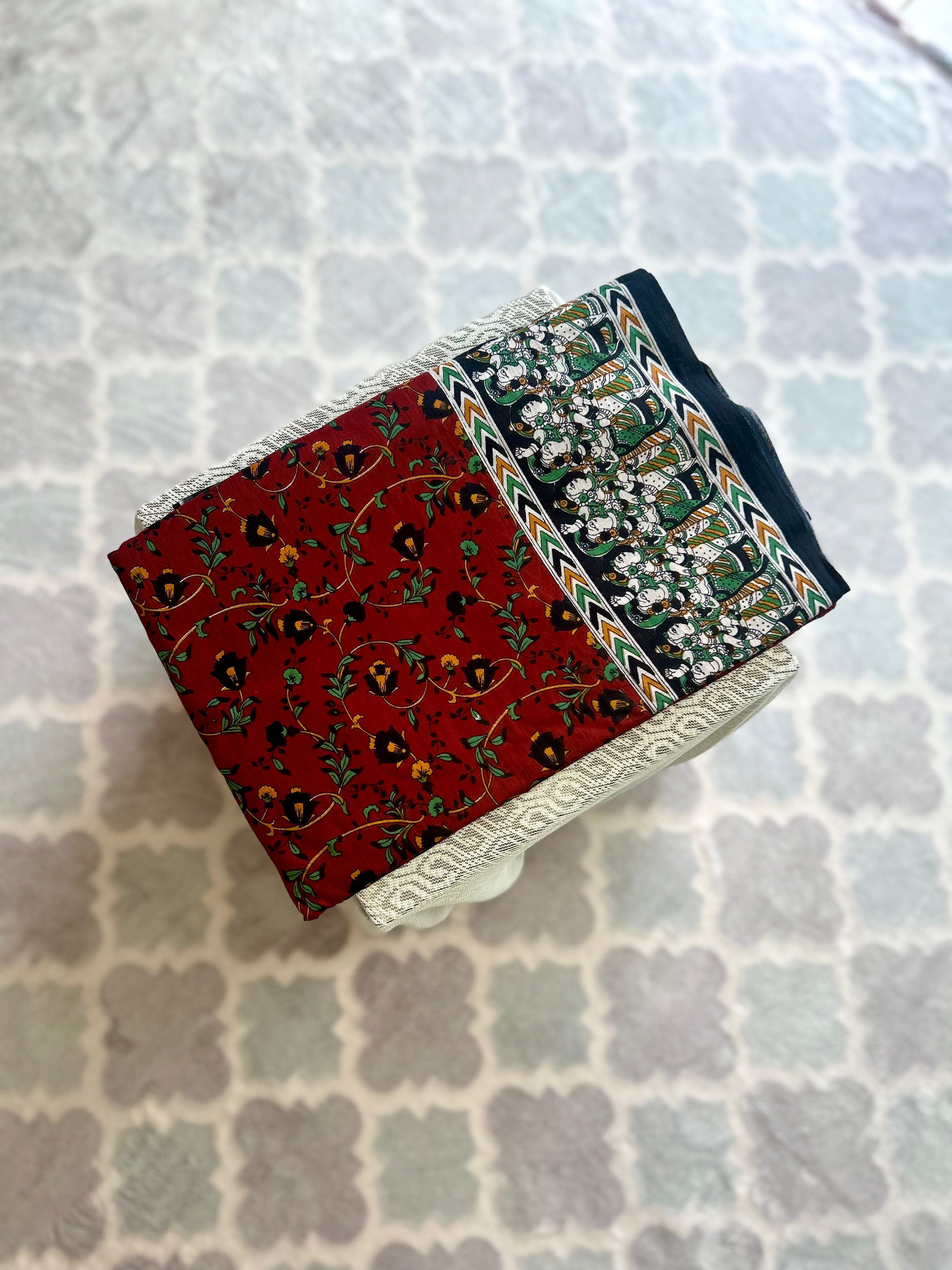 Rust Red Mulmul Cotton Saree with Floral Print & Traditional Border